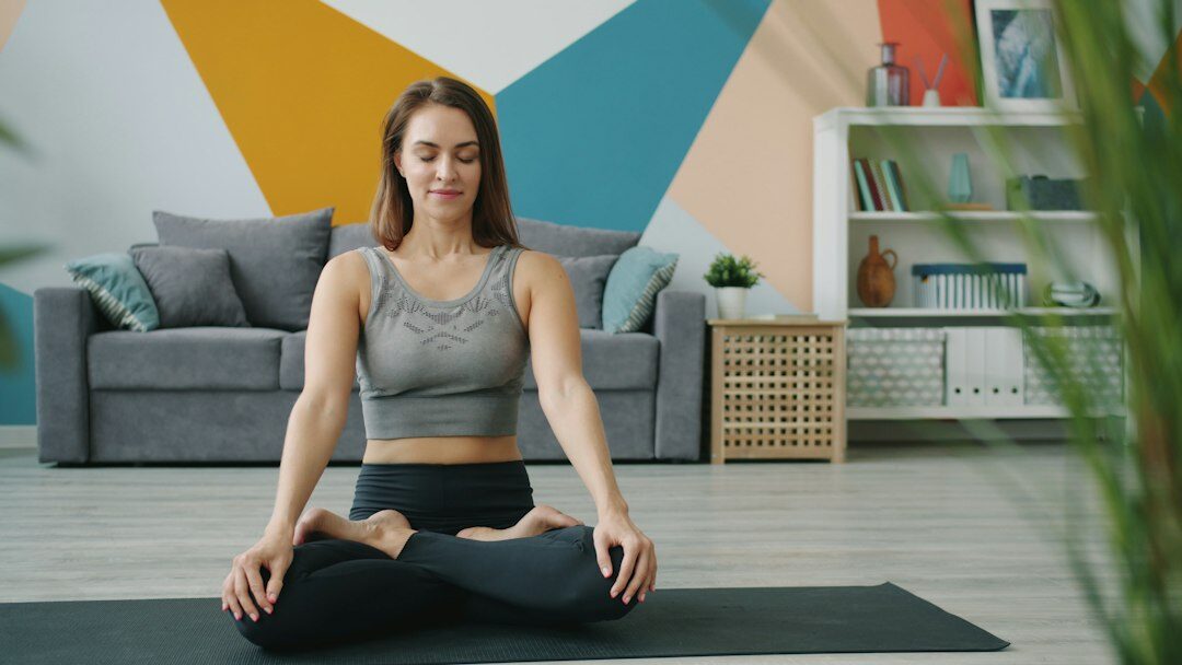 person meditating at home